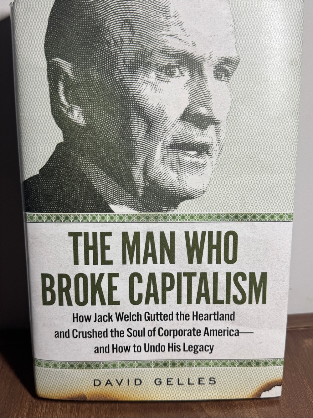 The Man Who Broke Capitalism by David Gelles — Green Hardcover Book